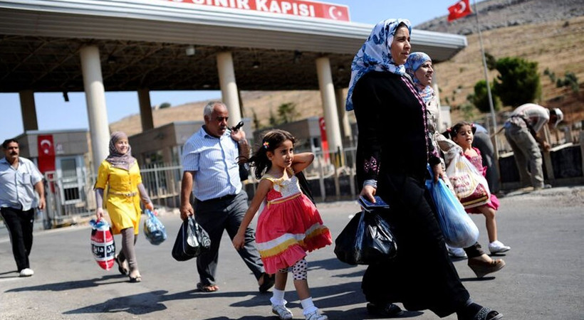 Suriye'den mültecilere 'ülkenize dönün' çağrısı yapıldı